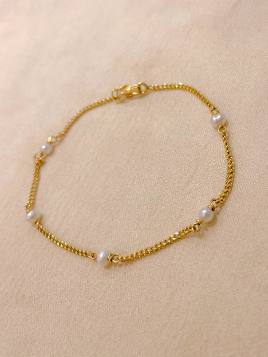 PULSERA ORO 18K Y PERLAS DEL RÍO